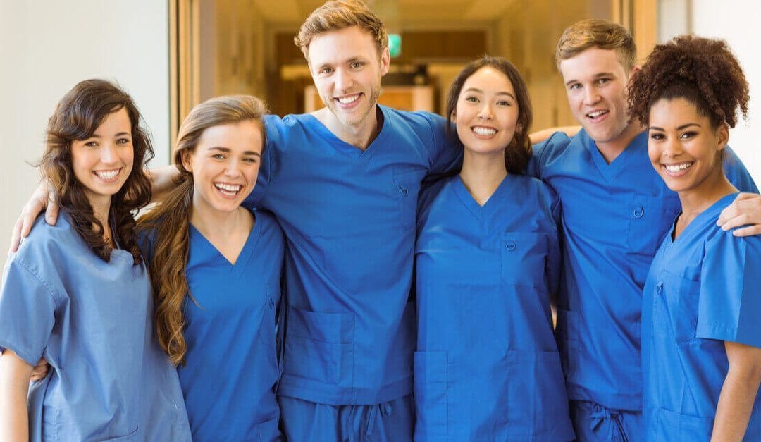 Group of health care professionals in scrubs